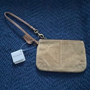 Coach wristlet with tags